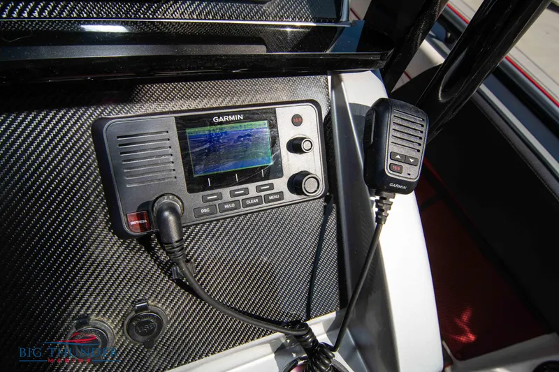 Slide: The Image of Garmin marine radio on 2021 Fountain 38 SC boat dashboard. - 44