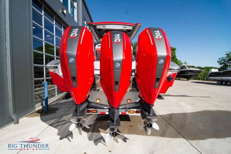 Slide: The Image of 2021 Fountain 38 SC boat with triple red Mercury outboard engines at Big Thunder Marine. - 6