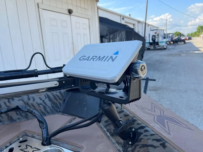 Slide: The Image of 2024 Express HyperLift H17 boat with Garmin navigation system. - 19