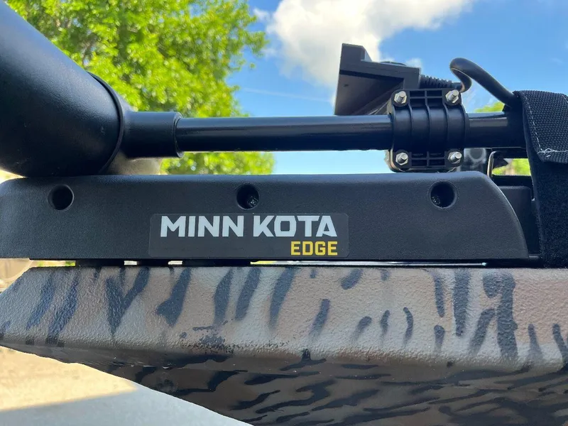 Slide: The Image of Minn Kota Edge trolling motor on 2024 Express HyperLift H17 boat. - 29