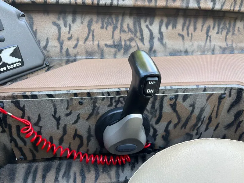 Slide: The Image of 2024 Express HyperLift H17 boat control lever with camo interior. - 54