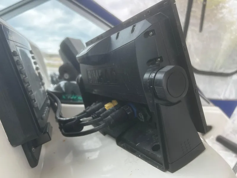 Slide: The Image of Close-up of marine electronics on a 2000 Wellcraft 330 Coastal boat. - 19