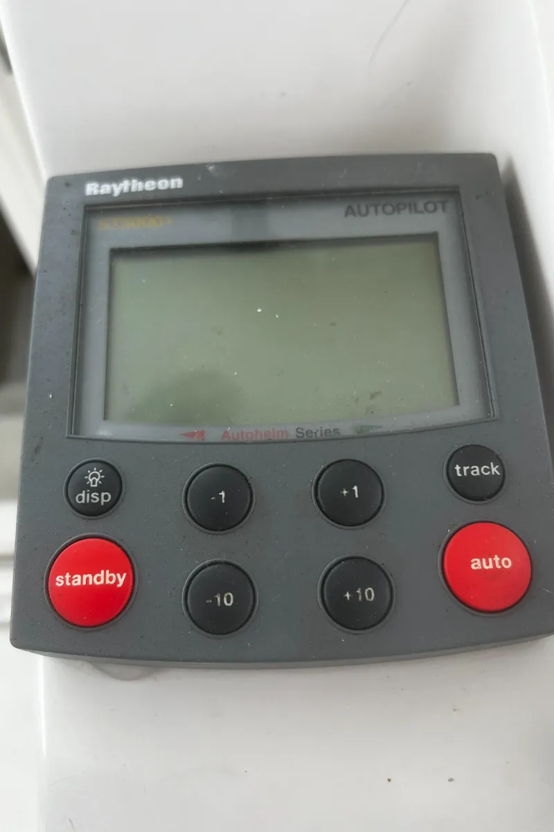 Slide: The Image of Raytheon autopilot control panel on a 2000 Wellcraft 330 Coastal boat. - 20