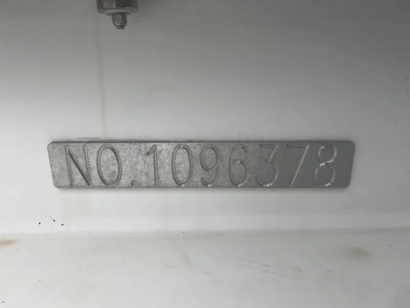 Slide: The Image of Serial number plate on 2000 Wellcraft 330 Coastal boat, displaying "NO. 1096378". - 36