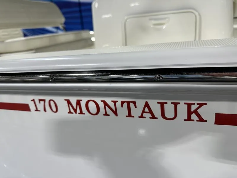 Slide: The Image of 2025 Boston Whaler 170 Montauk boat nameplate in red lettering. - 5