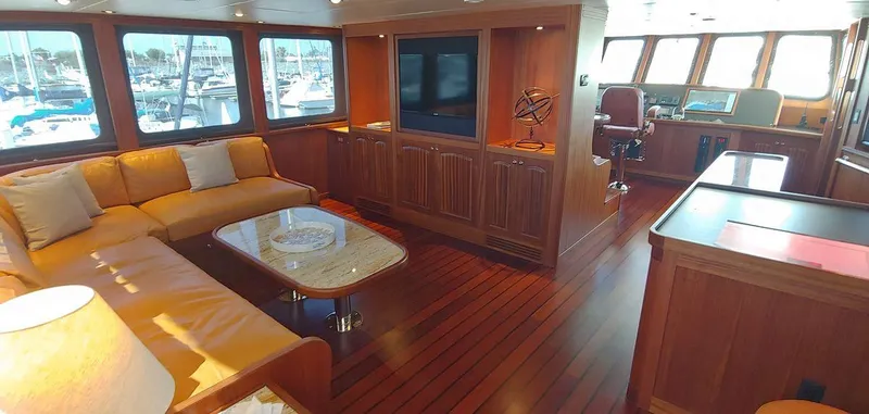 Slide: The Image of Luxurious interior of 2016 Allseas Expedition 92 yacht with wooden flooring and plush seating. - 17