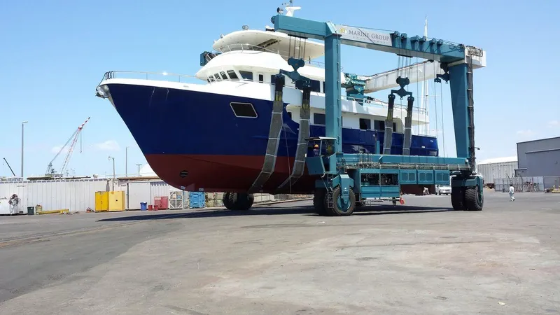 Slide: The Image of Allseas Expedition 92 yacht, 2016 model, on a ship lift at a dockyard. - 38
