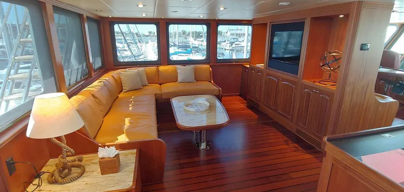 Slide: The Image of Luxurious interior of 2016 Allseas Expedition 92 yacht with wooden flooring and plush seating. - 6