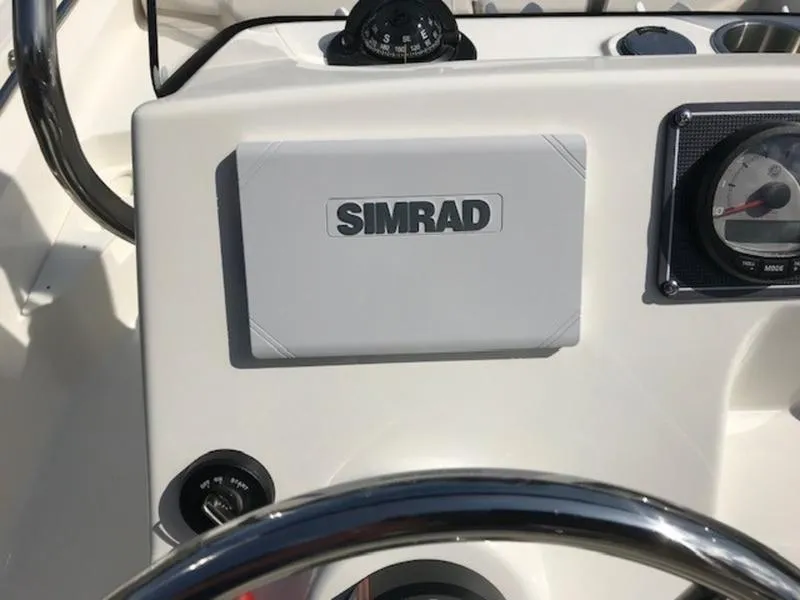 Slide: The Image of 2025 Boston Whaler 170 Montauk dashboard with Simrad navigation system. - 15