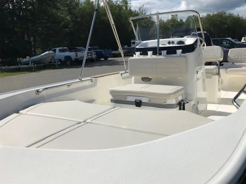 Slide: The Image of 2025 Boston Whaler 170 Montauk boat with spacious deck and seating. - 9