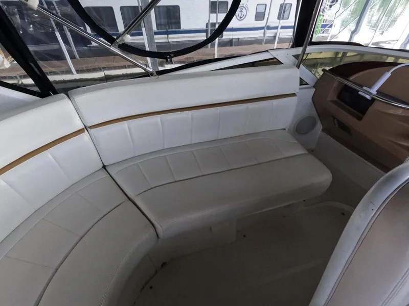 Slide: The Image of 2001 Carver 444 Cockpit Motor Yacht interior seating area. - 27