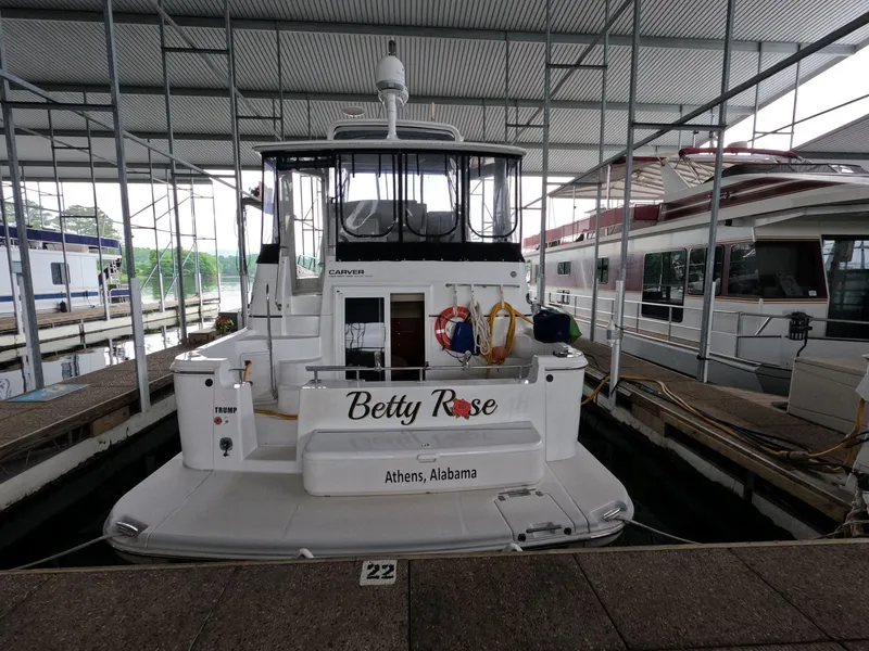 Slide: The Image of 2001 Carver 444 Cockpit Motor Yacht docked in marina, named Betty Rose from Athens, Alabama. - 6