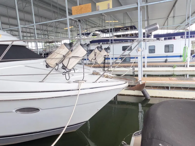 Slide: The Image of 2001 Carver 444 Cockpit Motor Yacht docked in a marina. - 9