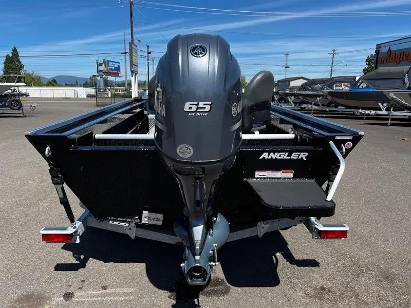 Slide: The Image of 2024 Fish Rite Angler boat with Yamaha 65 HP outboard motor, rear view. - 11