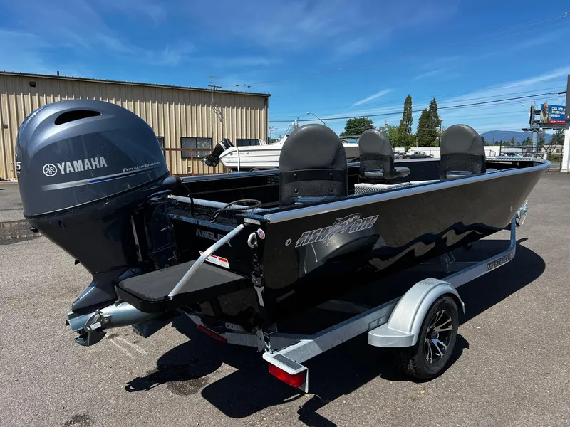 Slide: The Image of 2024 Fish Rite Angler boat with Yamaha outboard motor on trailer. - 12