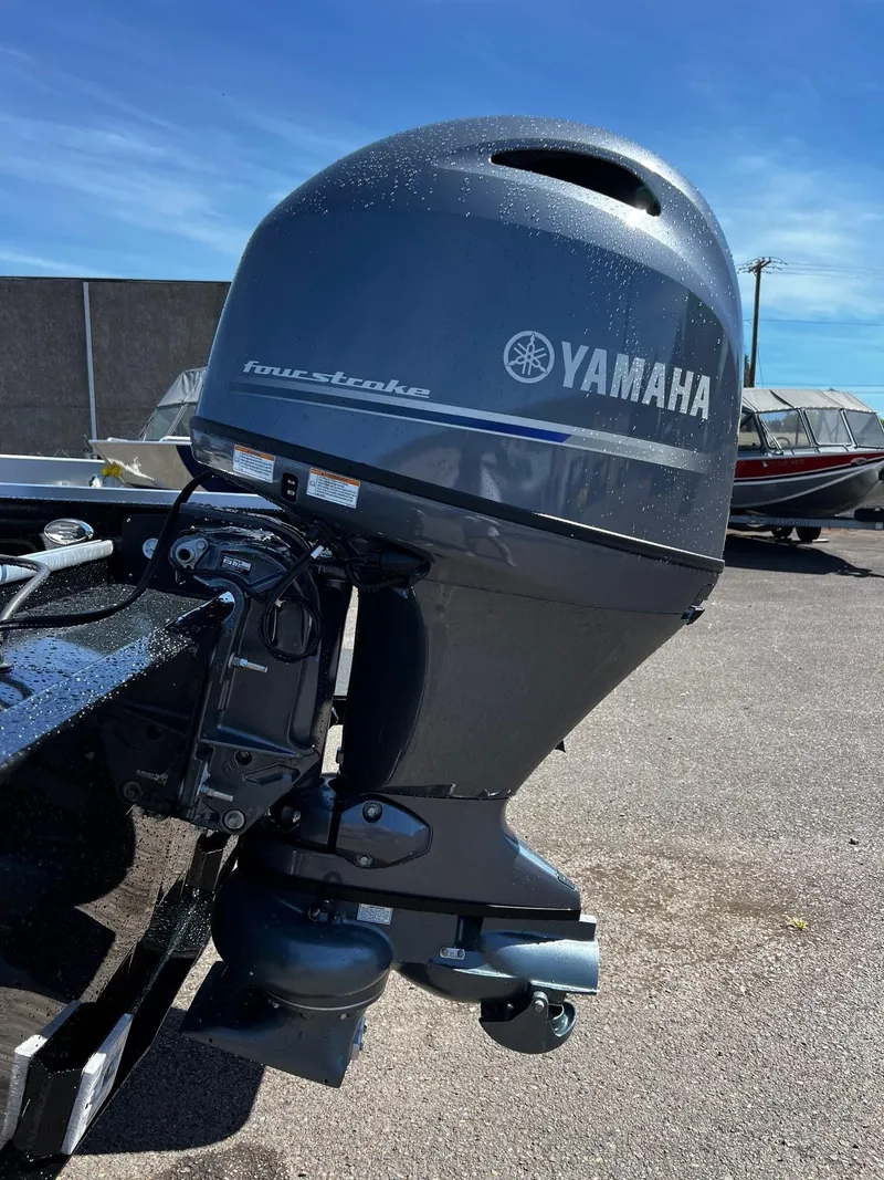 Slide: The Image of 2024 Fish Rite Angler boat with Yamaha four-stroke outboard motor. - 15