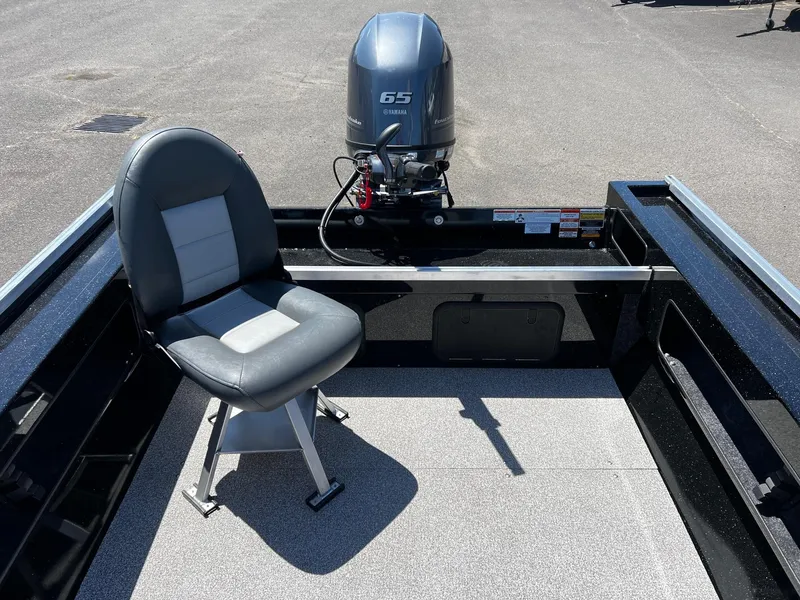 Slide: The Image of 2024 Fish Rite Angler boat with Yamaha 65 outboard motor and swivel seat. - 17