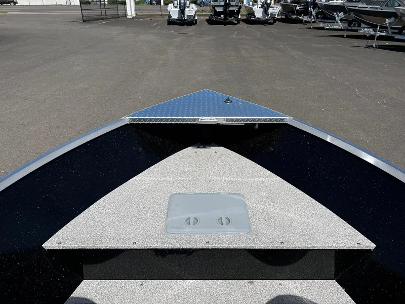Slide: The Image of 2024 Fish Rite Angler boat bow with storage compartment. - 25