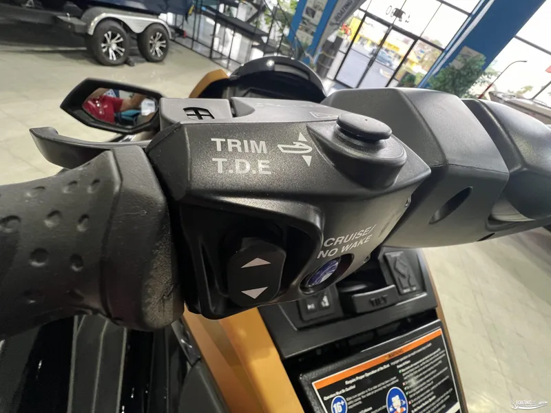 Slide: The Image of 2024 Yamaha WaveRunner FX Limited SVHO handlebar controls in showroom. - 9