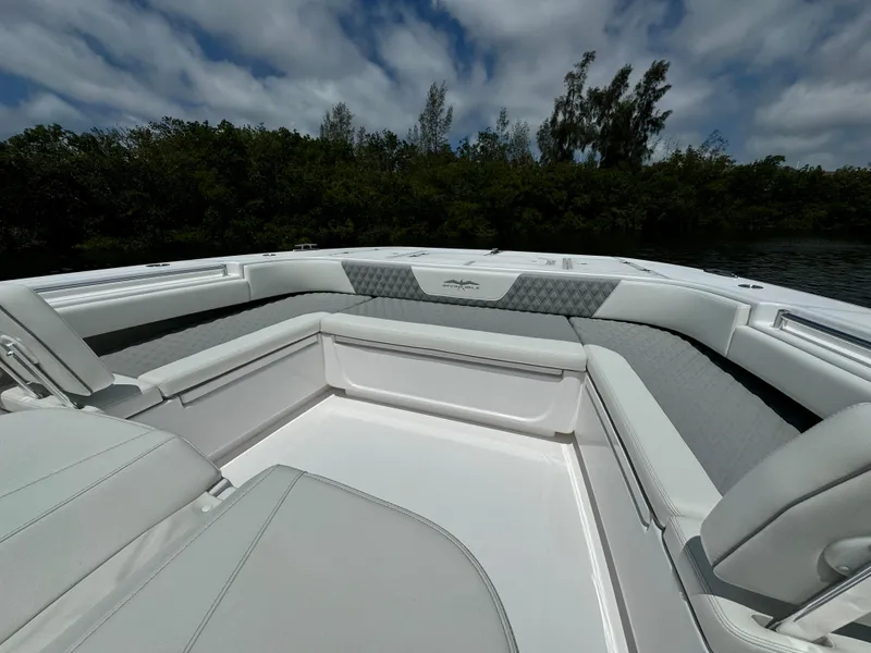 Slide: The Image of 2024 Invincible 40 Catamaran with spacious seating and luxurious interior. - 20