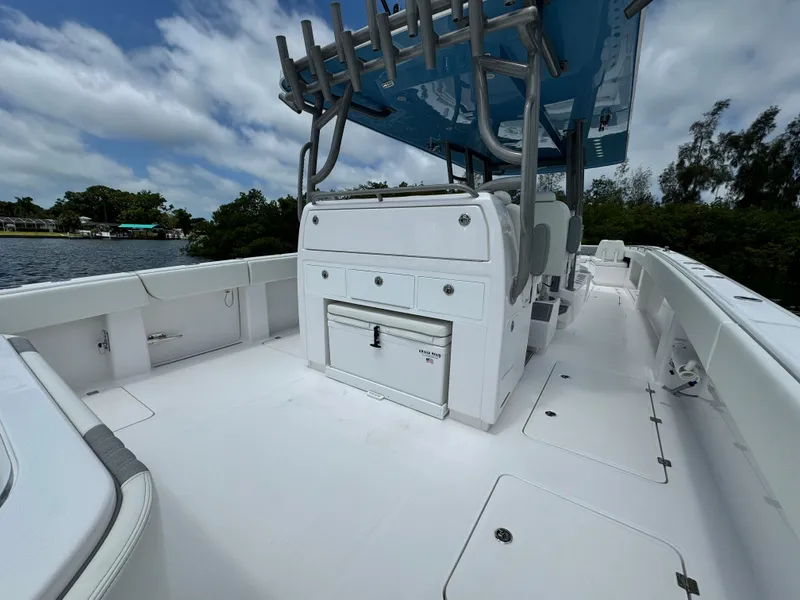 Slide: The Image of 2024 Invincible 40 Catamaran with spacious deck and modern amenities. - 8