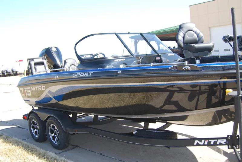 Slide: The Image of 2024 Nitro ZV19 Sport Pro boat on trailer, side view. - 3