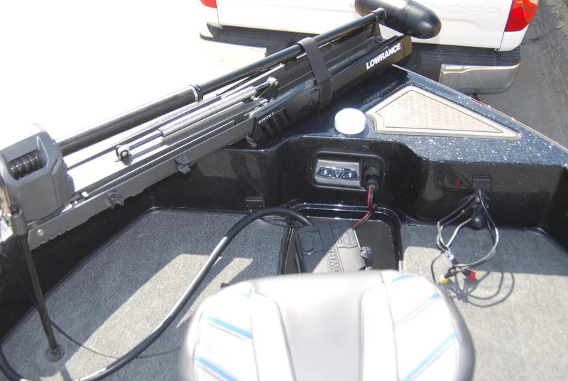Slide: The Image of 2024 Nitro ZV19 Sport Pro boat interior with Lowrance equipment and seating. - 6