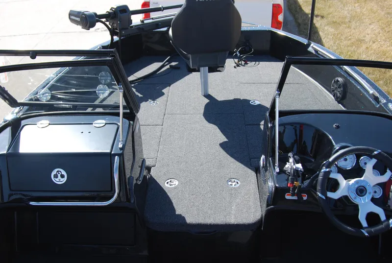 Slide: The Image of 2024 Nitro ZV19 Sport Pro boat interior with steering wheel and seating area. - 7