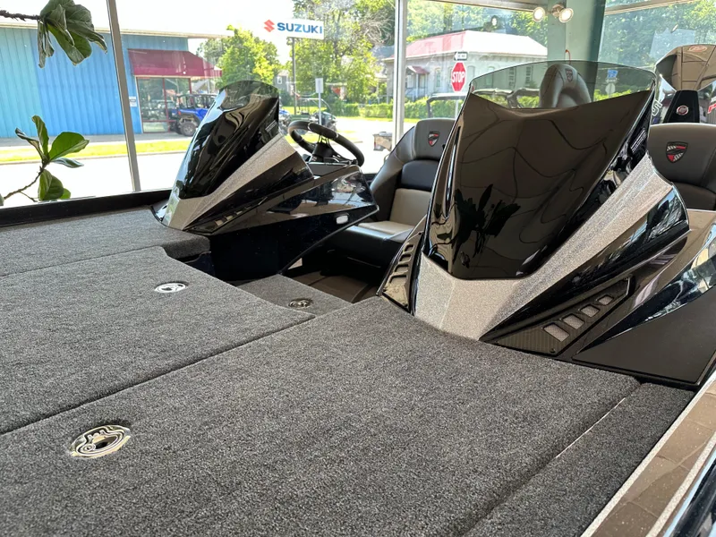 Slide: The Image of 2024 Triton 20XP Patriot boat interior with sleek design and modern dashboard. - 4