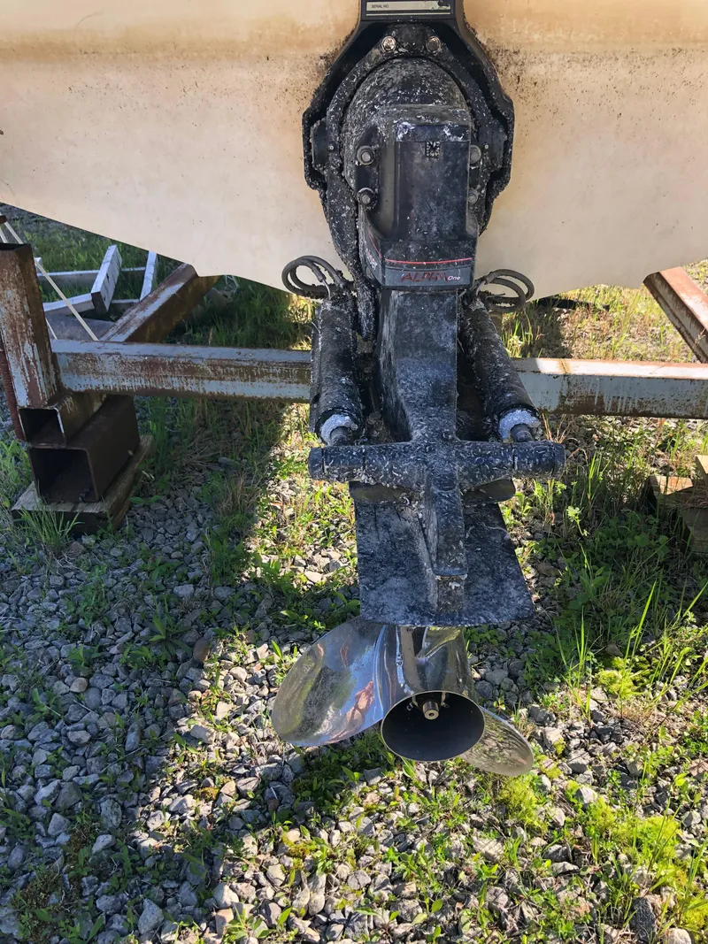 Slide: The Image of 1994 Sea Ray Overnighter boat propeller and stern drive on a trailer. - 10