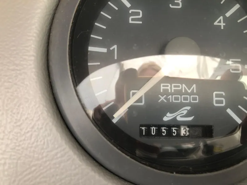 Slide: The Image of Tachometer of 1994 Sea Ray Overnighter showing RPM and hours logged. - 15