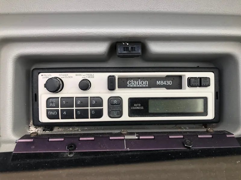 Slide: The Image of Clarion M8430 radio in 1994 Sea Ray Overnighter boat dashboard. - 16