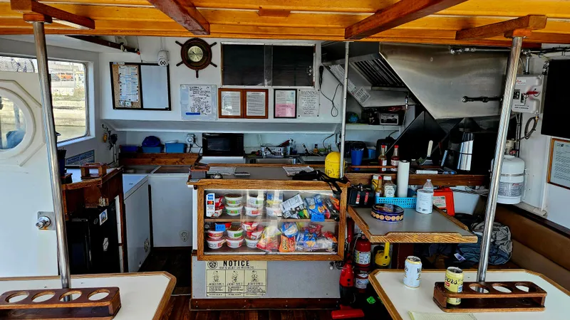 Slide: The Image of 1958 Ditmar & Donaldson sport boat interior with kitchen and snack area. - 7