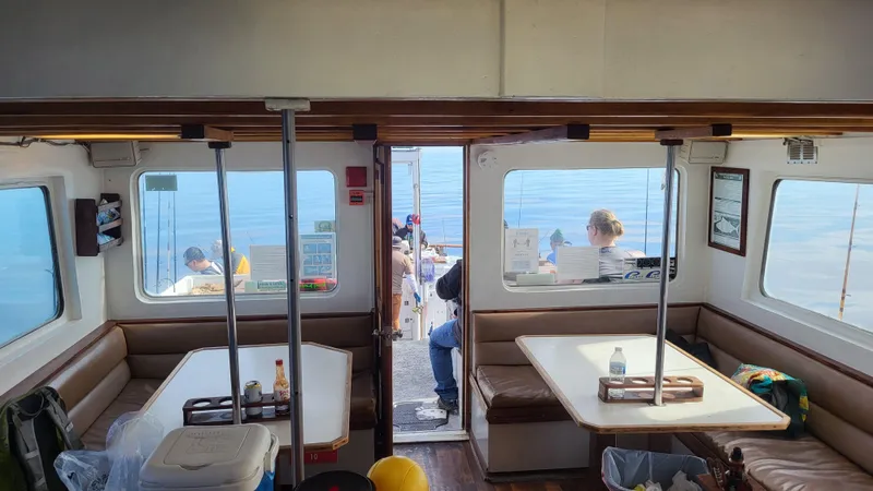 Slide: The Image of Interior of a 1958 Ditmar & Donaldson sport boat with seating and ocean view. - 8