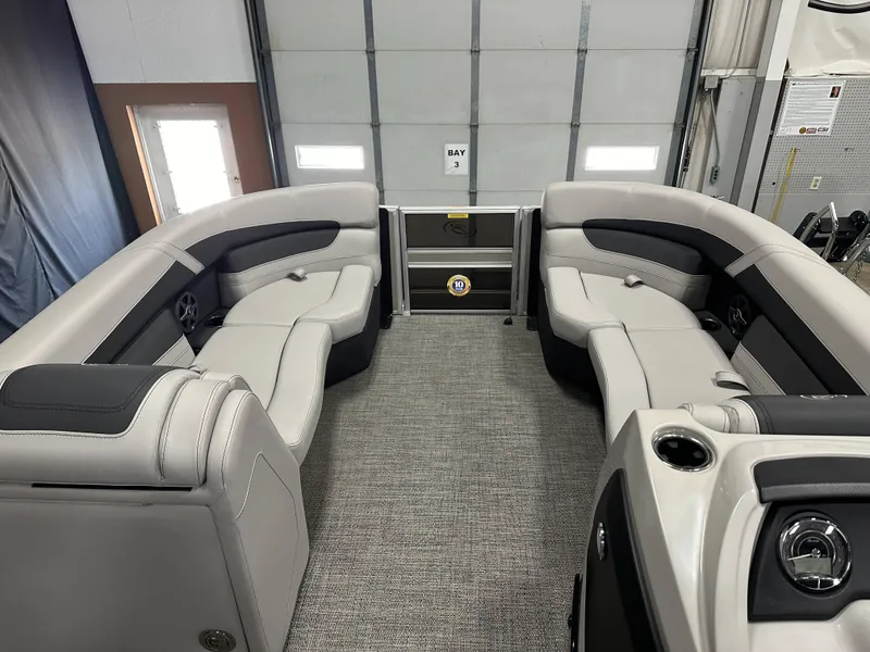Slide: The Image of 2025 Barletta Cabrio 22QC pontoon boat interior with luxurious seating and modern design. - 7