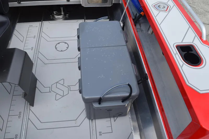 Slide: The Image of Stabicraft 1550 Frontier Profish 2025 interior with storage box and detailed flooring. - 16