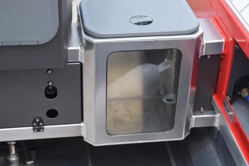 Slide: The Image of Stabicraft 1550 Frontier Profish 2025 storage compartment with transparent door. - 18