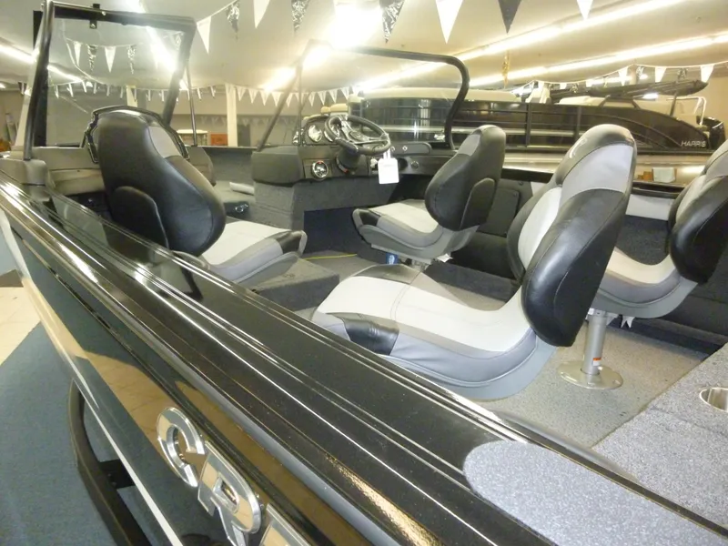Slide: The Image of 2024 Crestliner 1850 Super Hawk interior with seating and steering console. - 3