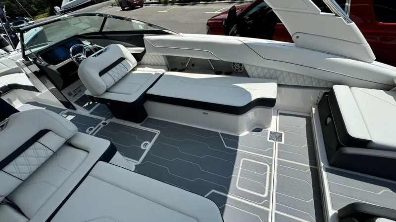 Slide: The Image of Luxurious interior of the 2025 Regal LX6 boat with modern seating and sleek design. - 19