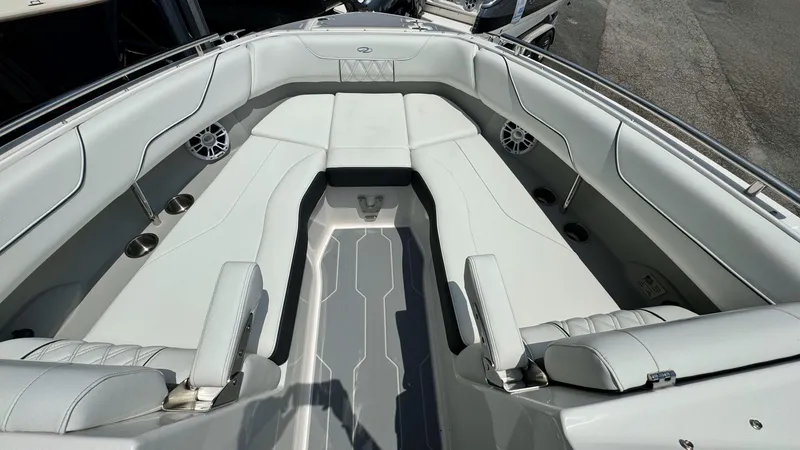Slide: The Image of 2025 Regal LX6 boat interior with spacious seating and modern design. - 31