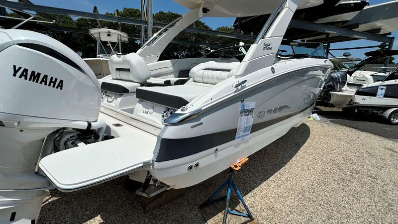 Slide: The Image of 2025 Regal LX6 boat with Yamaha engine on display. - 7