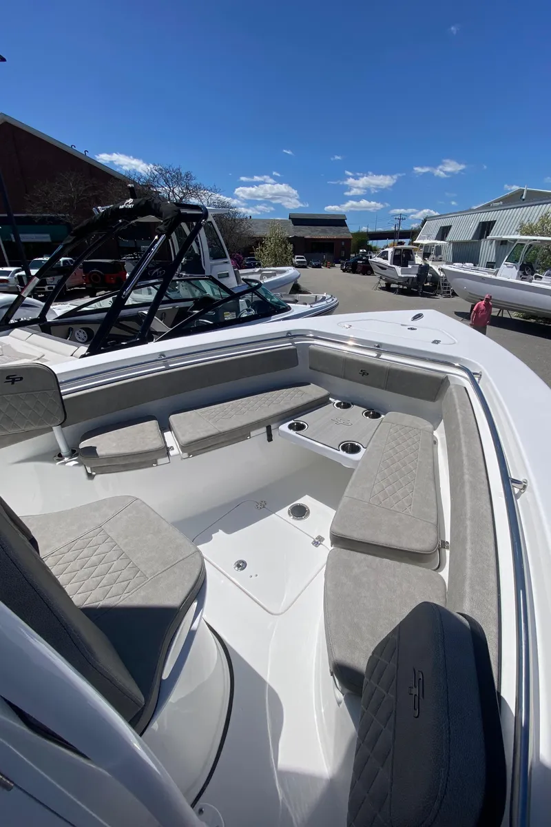 Slide: The Image of 2024 Sea Pro 222 Center Console boat with spacious seating and modern design. - 10
