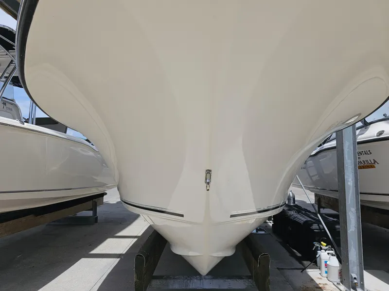 Slide: The Image of 2021 Key West 239 DFS boat hull in dry dock, side view. - 37