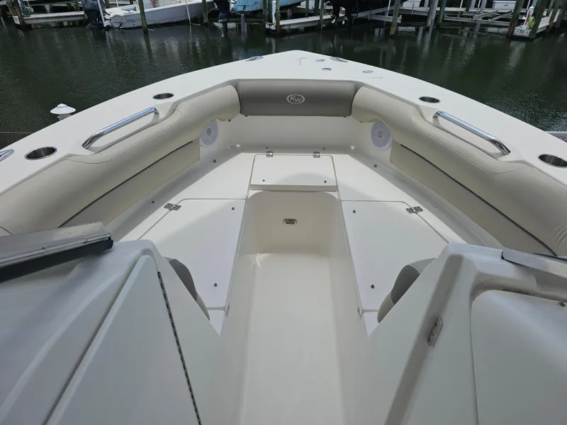 Slide: The Image of 2021 Key West 239 DFS boat interior, spacious seating and storage compartments. - 7