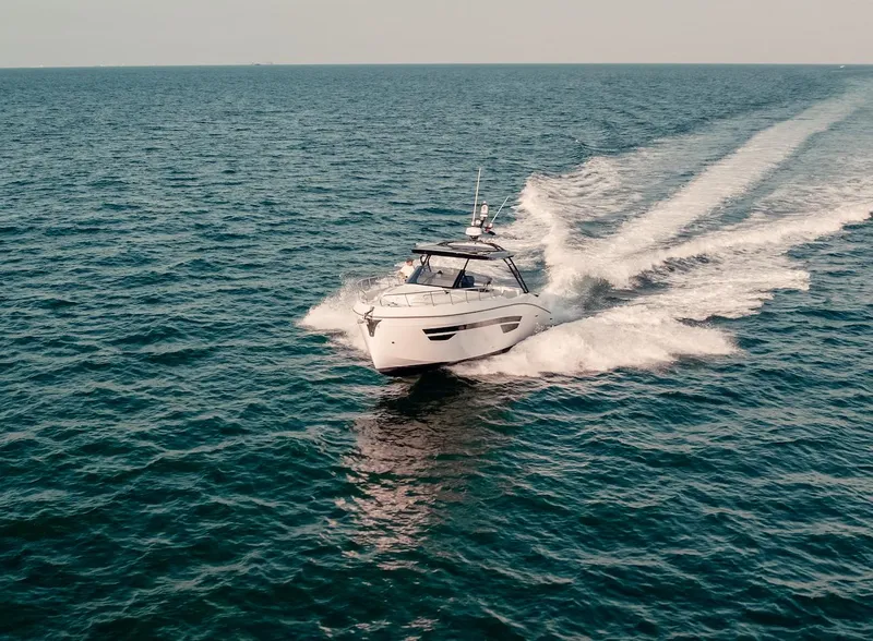 Slide: The Image of 2024 Oryx 379 boat cruising on open water. - 17