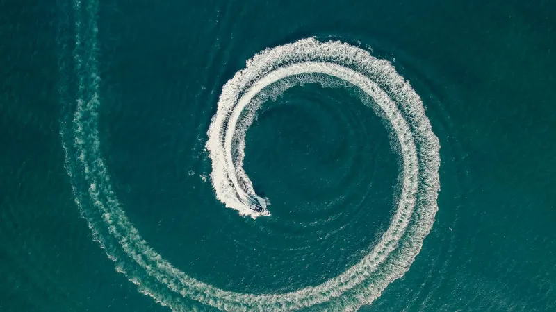 Slide: The Image of Aerial view of Oryx 379 boat making circular waves in the ocean, 2024 model. - 22