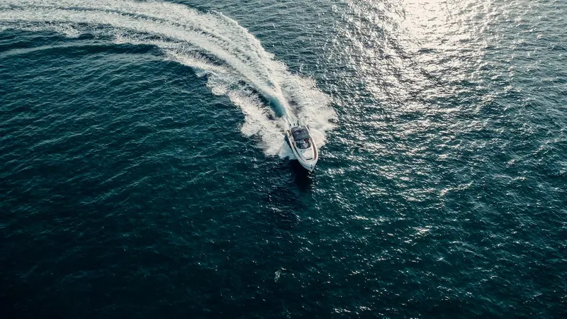 Slide: The Image of Aerial view of 2024 Oryx 379 boat cruising on open water. - 23