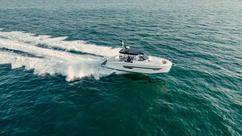 Slide: The Image of 2024 Oryx 379 boat cruising on open water. - 24
