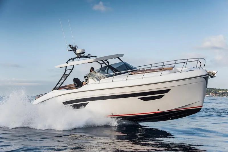 Slide: The Image of 2024 Oryx 379 boat cruising on open water. - 4