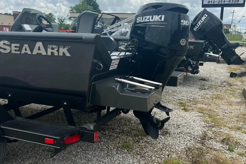 Slide: The Image of 2024 SeaArk 872 RX boats with Suzuki outboard motors on display. - 3